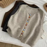 Maribel | Gilet in maglia con bottoni colorati