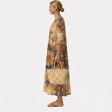 Abito Dora con stampa floreale ed eleganza naturale